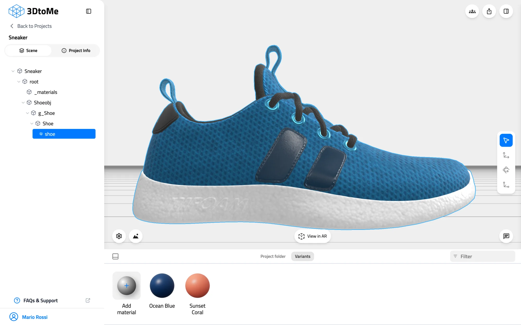 Variants tab of the Assets panel with the shoe node selected in the Scene tab. The tab shows the Add material tile and two variant tiles, Ocean Blue and Sunset Coral.